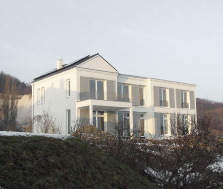 Neubau eines Mehrfamilienauses mit Bürofläche auf Rügen als Passivhaus